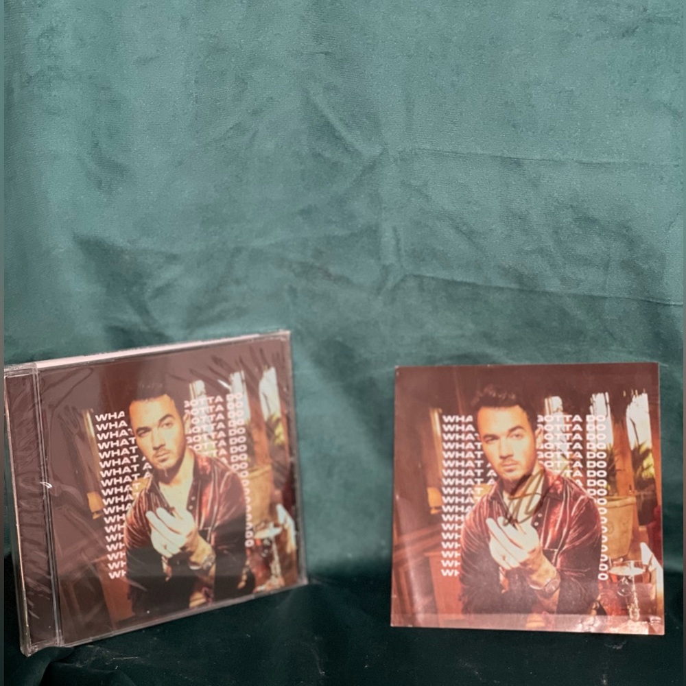 SIGNED Kevin Jonas What A Man Gotta Do CD insert and sealed CD